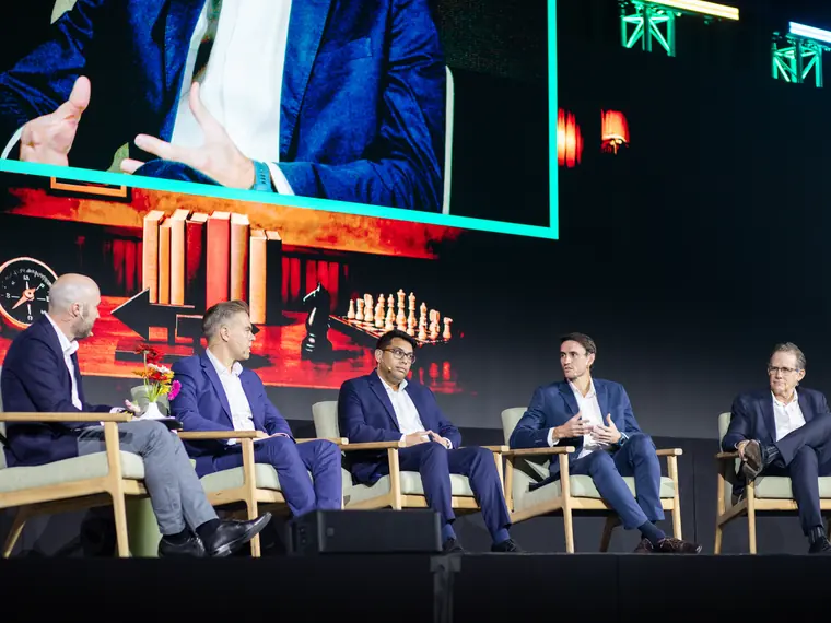 The Investment Forum 2026 — panellists in conversation on stage