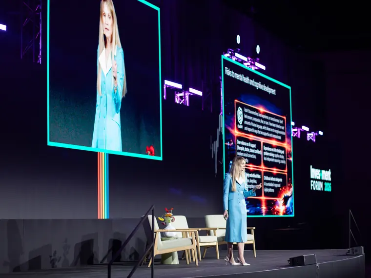 The Investment Forum 2026 — a speaker presenting to delegates
